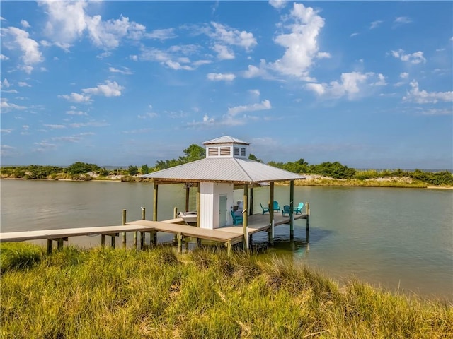 view of dock with a water view and boat lift