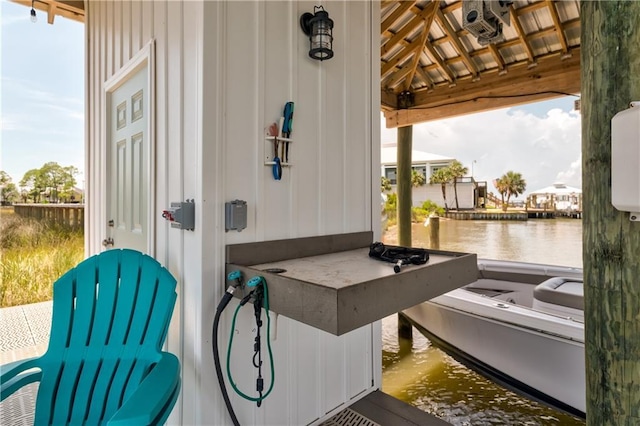 view of patio with a water view