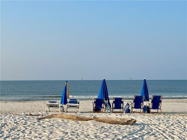 view of water feature with a beach view