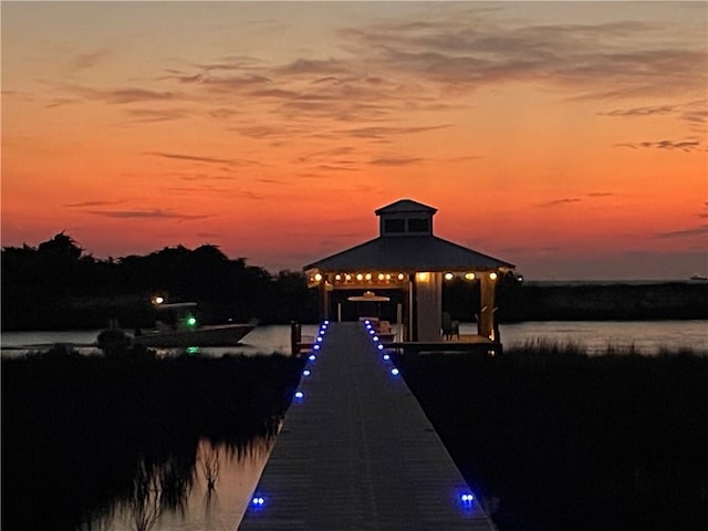 dock area featuring a gazebo and a water view