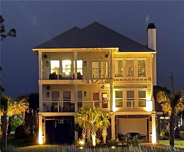 view of front facade with a balcony