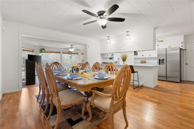 dining room with light wood finished floors