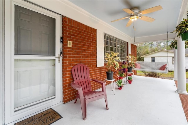 view of patio / terrace with covered porch and a ceiling fan