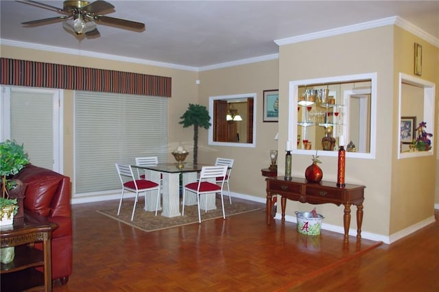 dining space with crown molding, ceiling fan, and dark parquet flooring