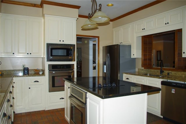 kitchen featuring a center island, sink, white cabinets, and black appliances