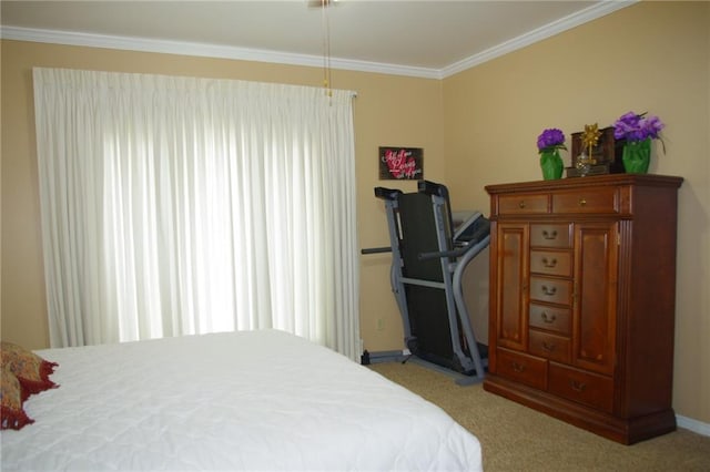 bedroom featuring ornamental molding and light carpet