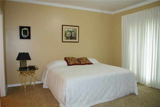 carpeted bedroom with ornamental molding