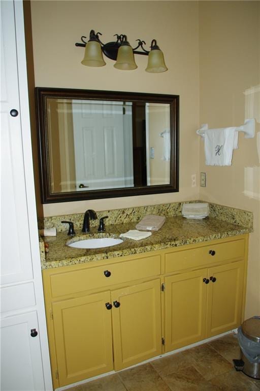 bathroom featuring vanity and tile patterned flooring