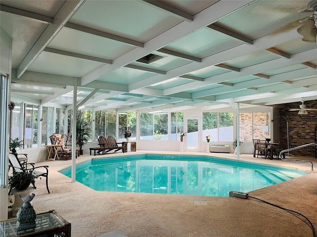 view of swimming pool featuring ceiling fan