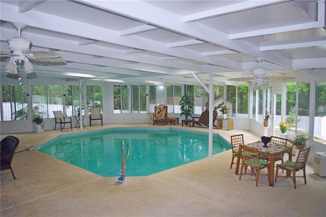 view of swimming pool featuring ceiling fan