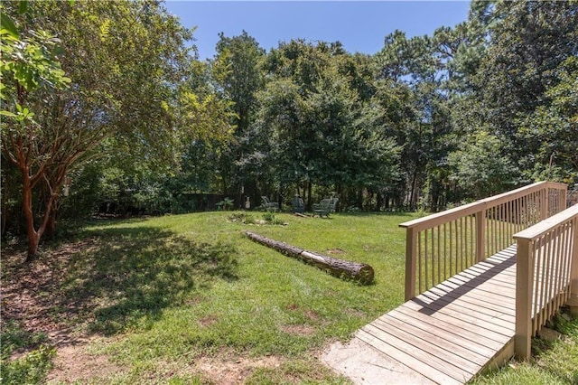 view of yard with a deck