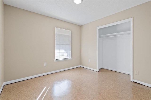 unfurnished bedroom featuring a closet