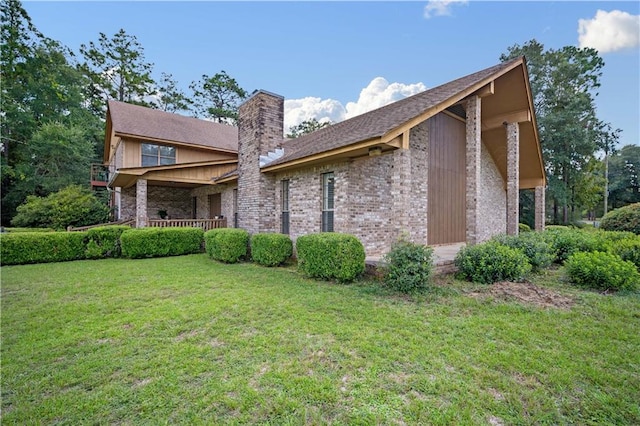 view of home's exterior with a yard