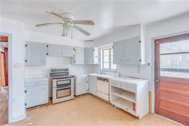 kitchen featuring open shelves, double oven range, white dishwasher, and gray cabinets