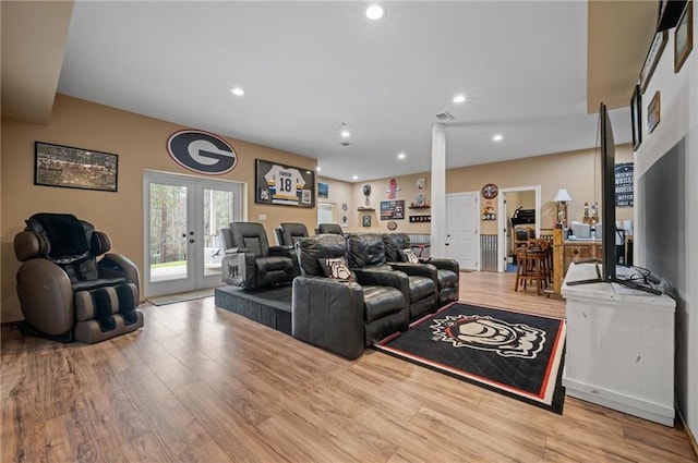 living area featuring french doors, wood finished floors, visible vents, and recessed lighting