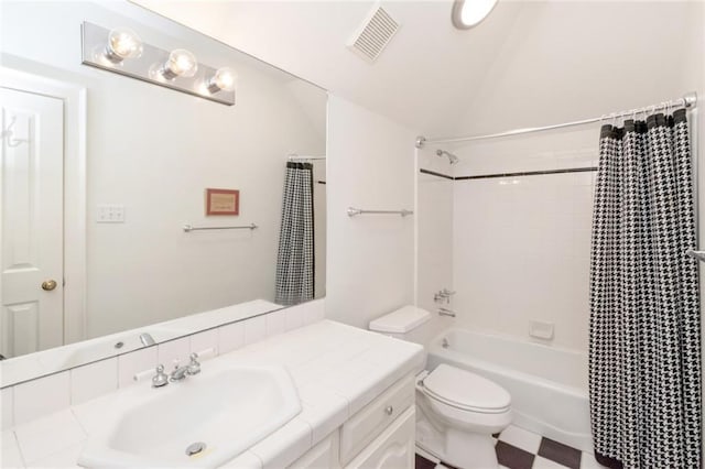 full bathroom featuring shower / tub combo with curtain, visible vents, toilet, vaulted ceiling, and vanity