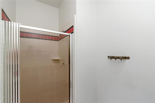 bathroom featuring a stall shower