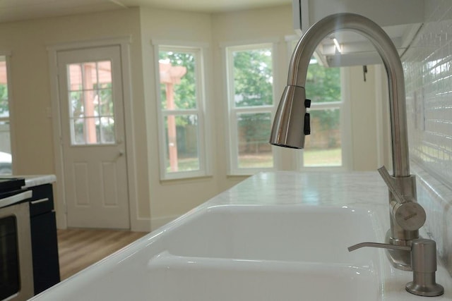 871 Hale Rd, Mobile, AL 36608 - kitchen featuring light countertops and a sink