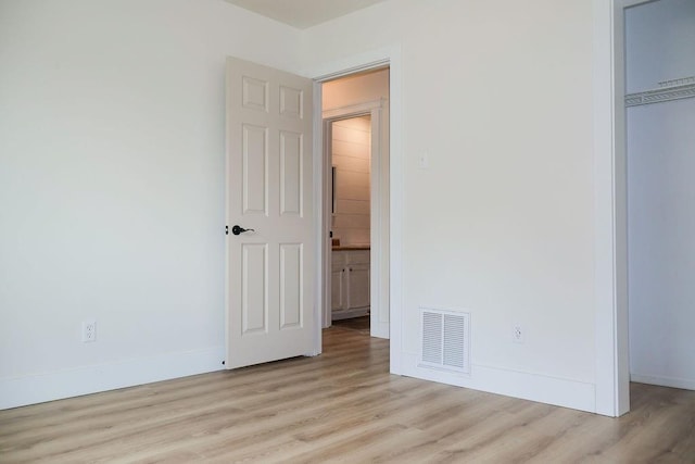 871 Hale Rd, Mobile, AL 36608 - unfurnished bedroom featuring light wood-style floors, baseboards, and a closet