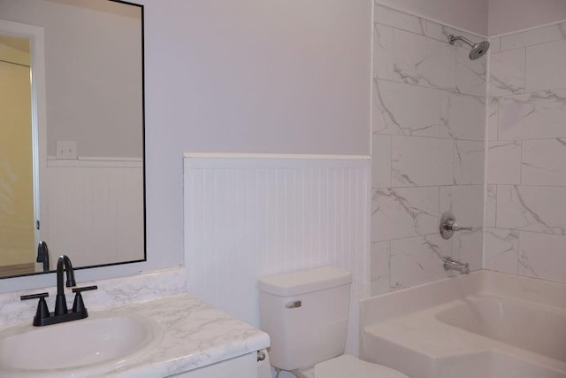 871 Hale Rd, Mobile, AL 36608 - full bathroom with wainscoting, vanity, washtub / shower combination, and toilet