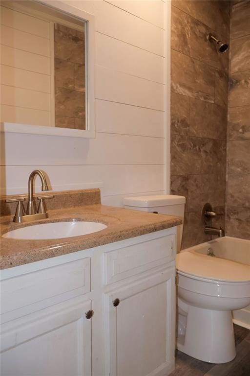 871 Hale Rd, Mobile, AL 36608 - full bathroom featuring vanity, washtub / shower combination, and toilet