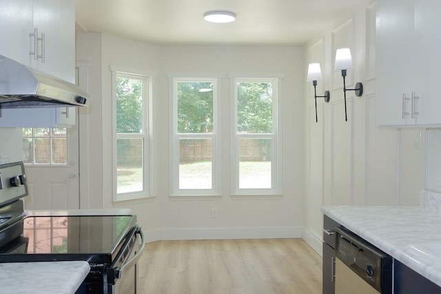 871 Hale Rd, Mobile, AL 36608 - dining room featuring light wood-style flooring and baseboards