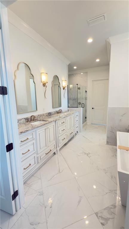 full bath with visible vents, double vanity, a stall shower, crown molding, and marble finish floor