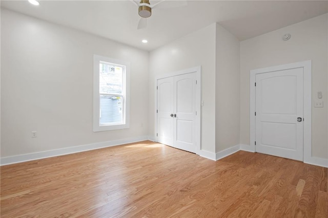 unfurnished bedroom with baseboards, light wood-style flooring, ceiling fan, and recessed lighting