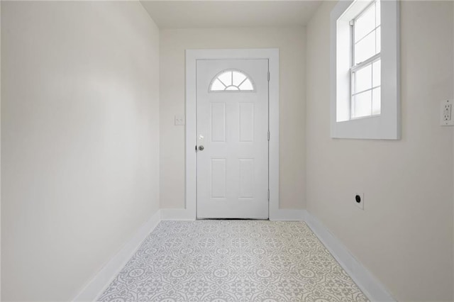 doorway with baseboards