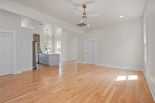unfurnished living room featuring recessed lighting, baseboards, light wood-style floors, visible vents, and a ceiling fan