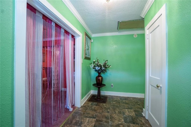 hallway with a textured ceiling and ornamental molding