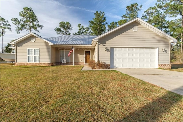 ranch-style home with an attached garage, metal roof, a front lawn, and concrete driveway