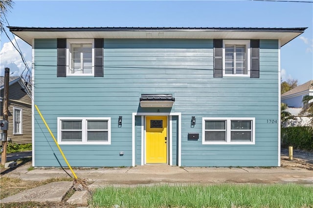 view of front of home with metal roof