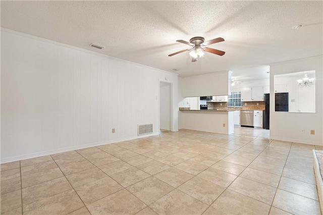 unfurnished living room with ceiling fan with notable chandelier, a textured ceiling, and light tile patterned floors