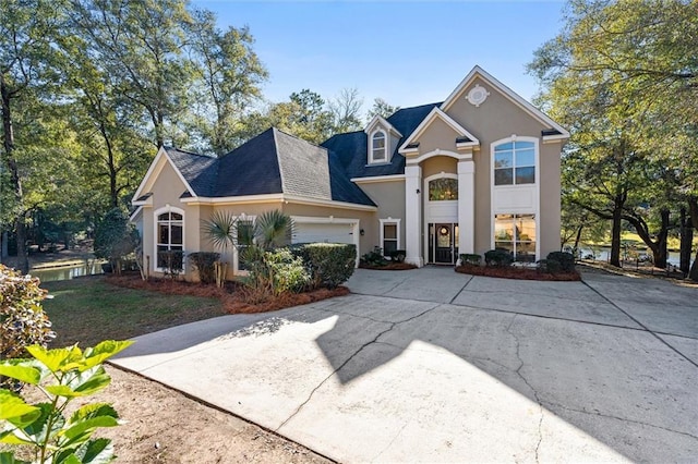 view of front of property with a garage