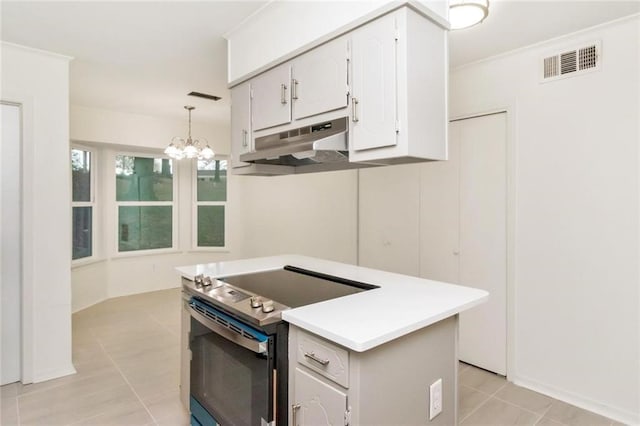 9636 Hamilton Creek Dr S, Mobile, AL 36695 - kitchen with electric stove, under cabinet range hood, white cabinets, light countertops, and a chandelier