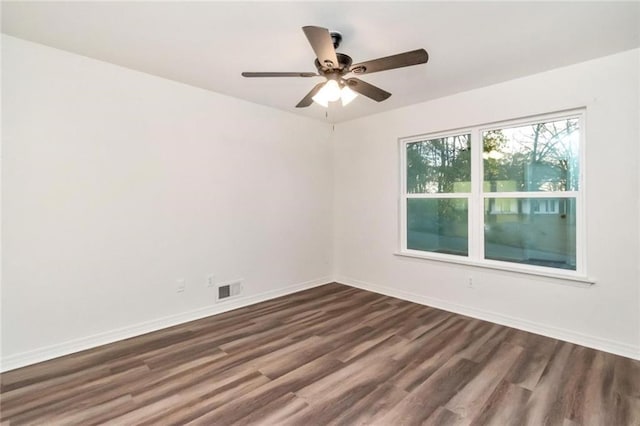 9636 Hamilton Creek Dr S, Mobile, AL 36695 - spare room featuring dark wood-type flooring and ceiling fan