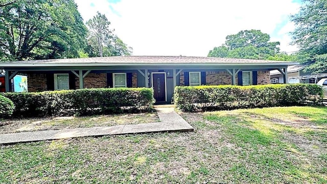 6980 Charmingdale Dr S, Mobile, AL 36618 - ranch-style home with brick siding and a front yard