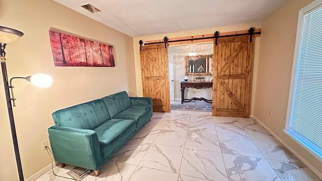 6980 Charmingdale Dr S, Mobile, AL 36618 - sitting room with a barn door, marble finish floors, and baseboards