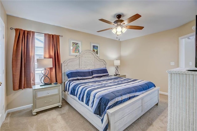 6194 State Highway 59 Unit D-8, Gulf Shores, AL 36542 - bedroom featuring light carpet, baseboards, and ceiling fan