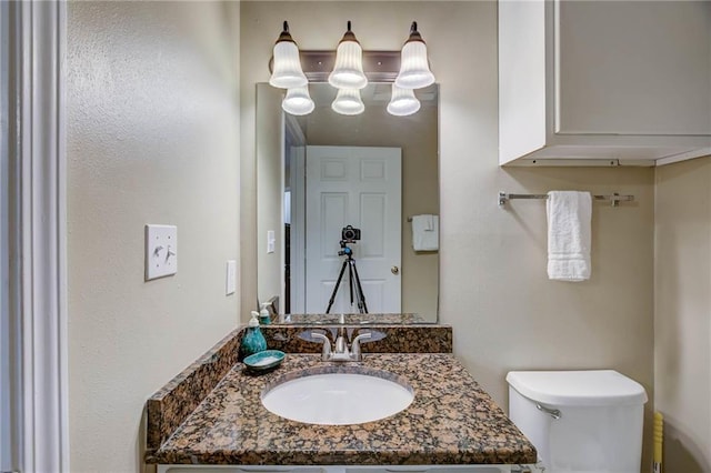 6194 State Highway 59 Unit D-8, Gulf Shores, AL 36542 - bathroom featuring toilet and vanity