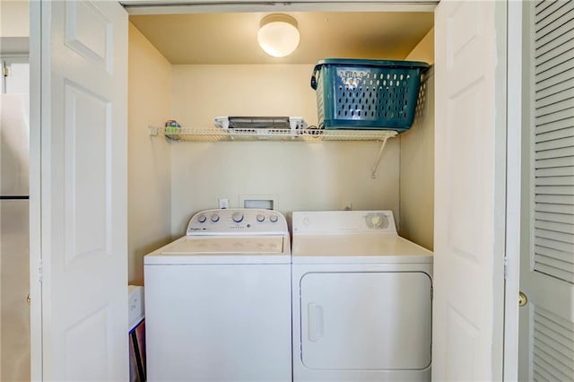 6194 State Highway 59 Unit D-8, Gulf Shores, AL 36542 - laundry area featuring separate washer and dryer