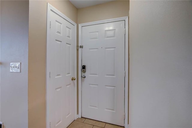 6194 State Highway 59 Unit D-8, Gulf Shores, AL 36542 - doorway to outside featuring light tile patterned floors