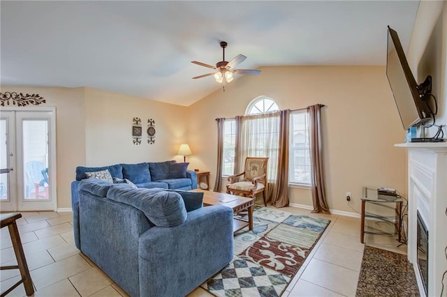 6194 State Highway 59 Unit D-8, Gulf Shores, AL 36542 - living room featuring a ceiling fan, a fireplace with flush hearth, light tile patterned floors, lofted ceiling, and baseboards