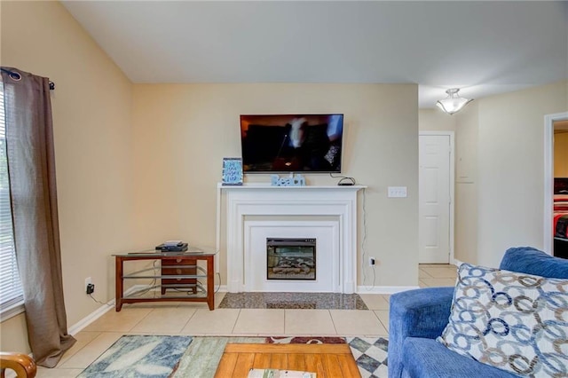6194 State Highway 59 Unit D-8, Gulf Shores, AL 36542 - tiled living room with a fireplace and baseboards