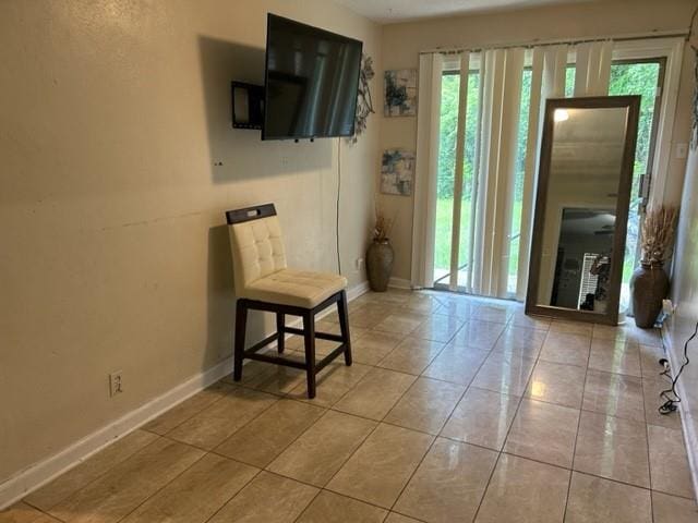 foyer entrance with tile patterned floors