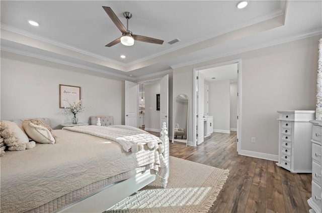 bedroom featuring crown molding, ceiling fan, dark hardwood / wood-style floors, and a raised ceiling