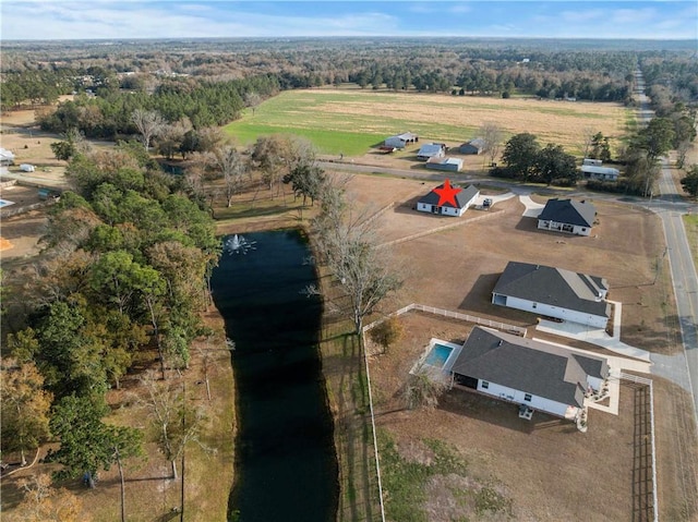 bird's eye view featuring a water view and a rural view