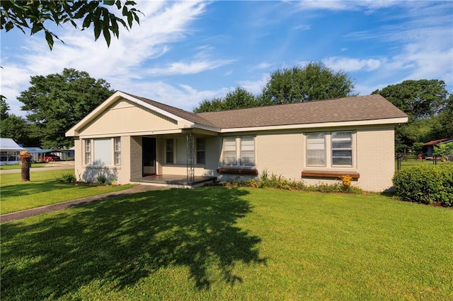 208 Beck St, Atmore, AL 36502 - ranch-style house featuring brick siding and a front yard