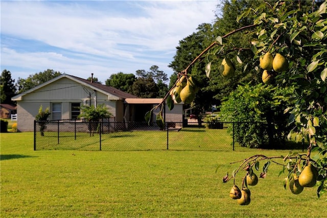 208 Beck St, Atmore, AL 36502 - view of yard featuring a carport